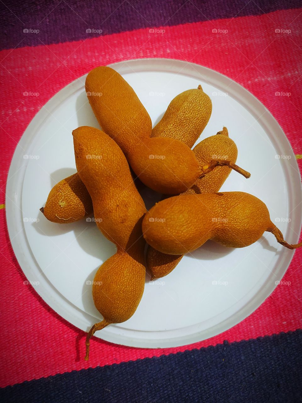 tamarind also called Pod Fruits brown colour with Sweet taste
