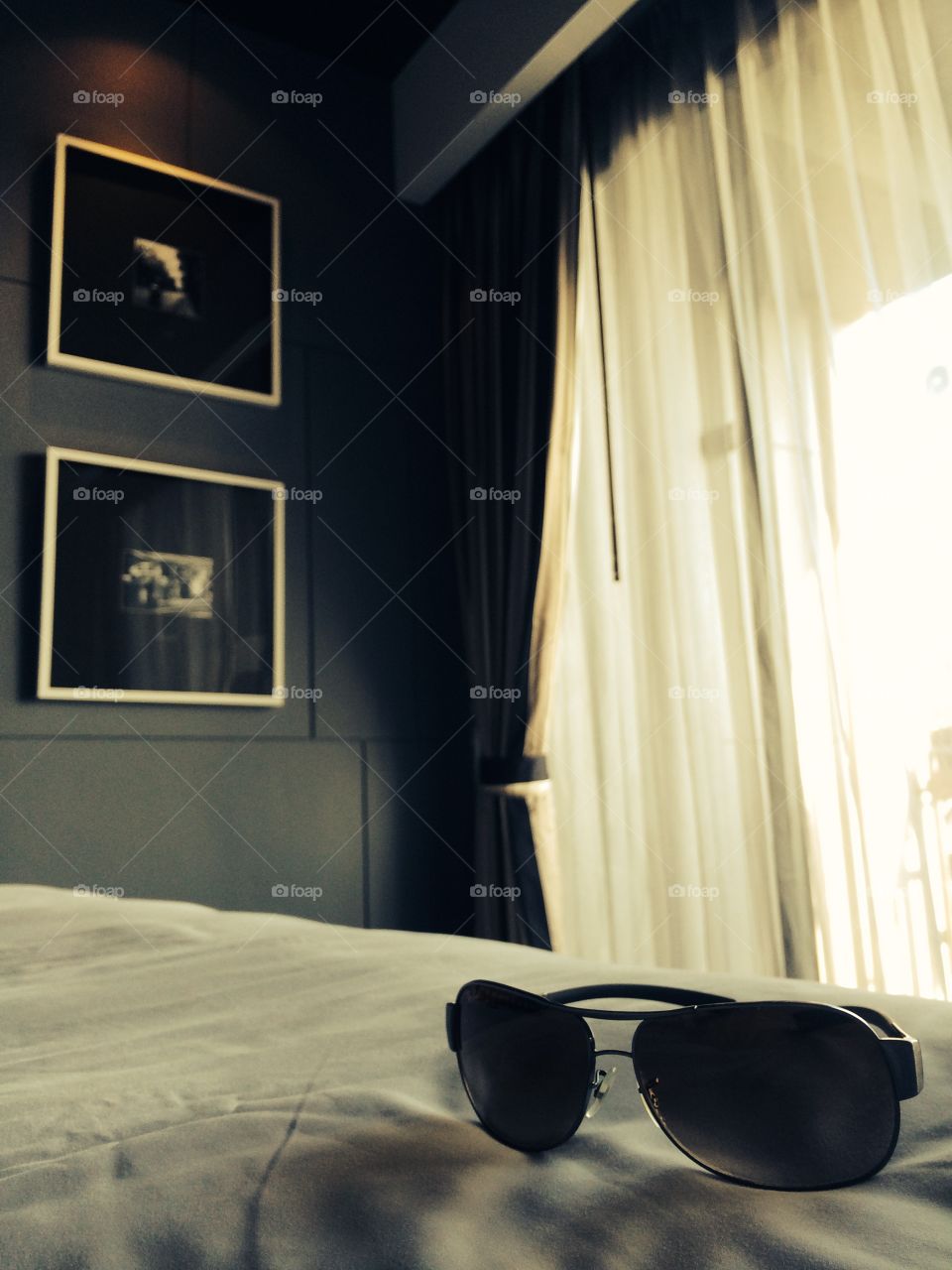 Sunglasses in bedroom