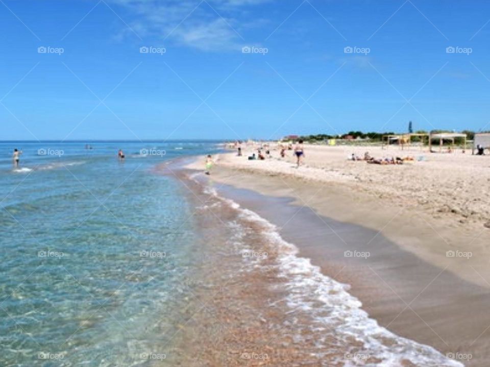Beach, tourists and summer