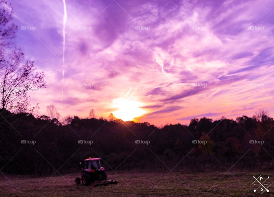 Beautiful sunset on the farm. Colorful