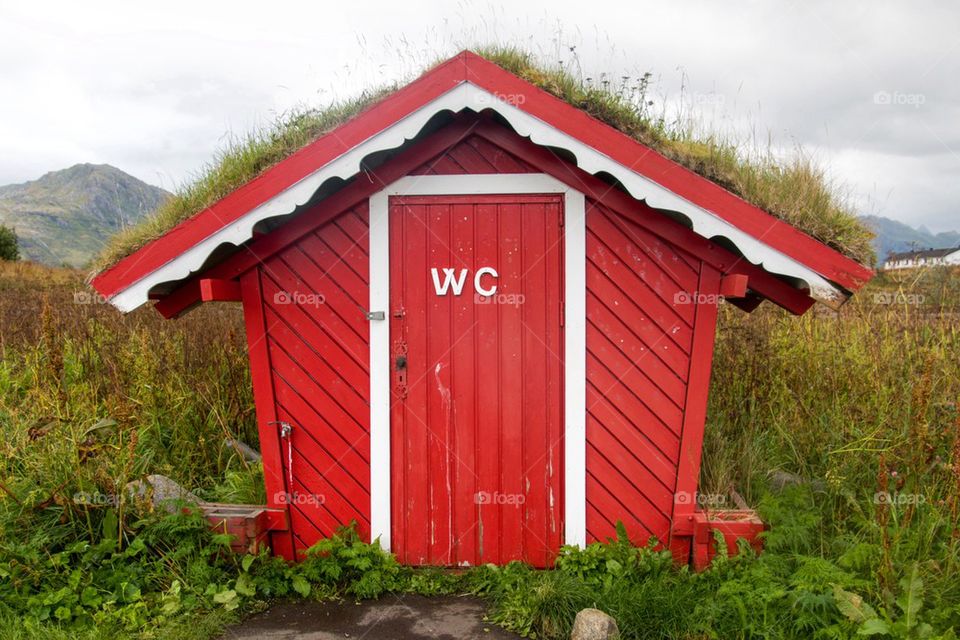 Cute red outhouse 