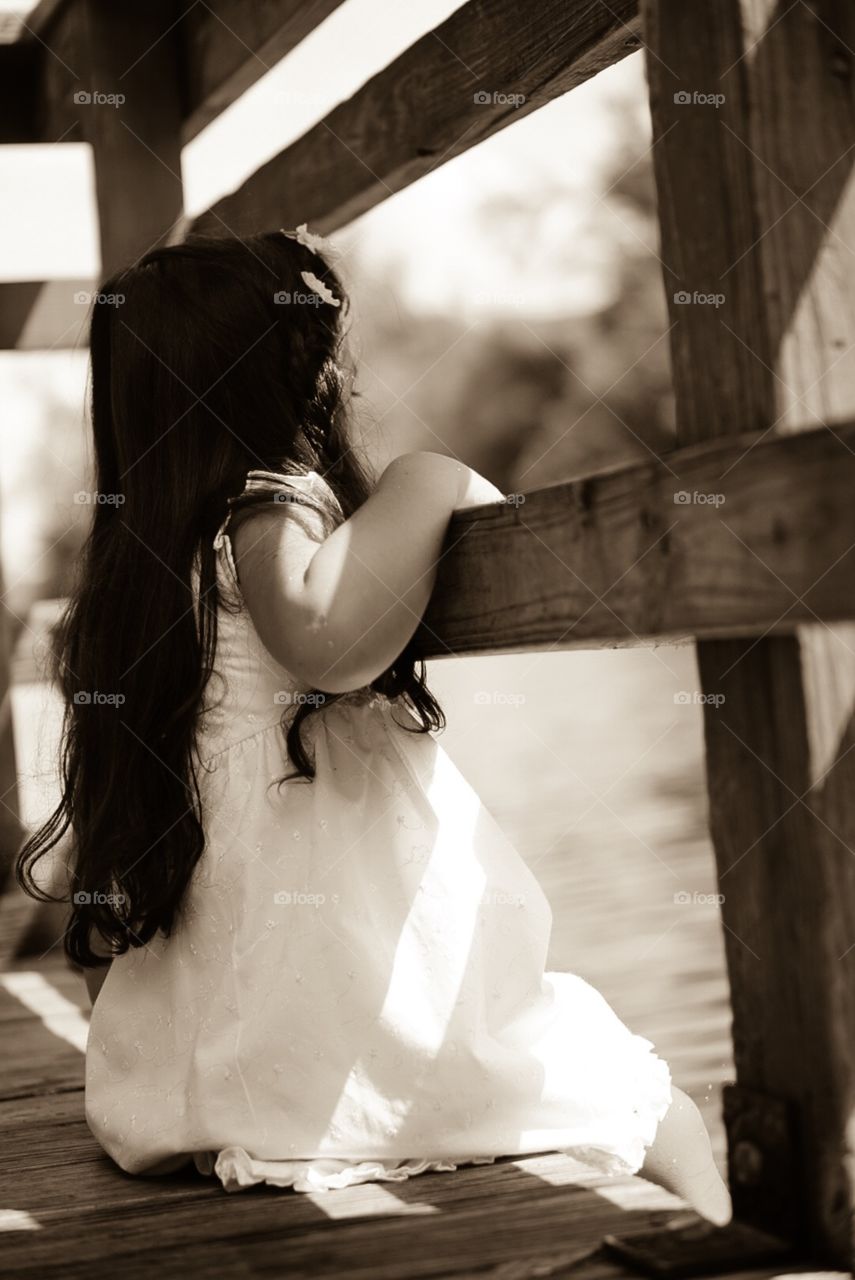 Little Girl Looking at Lake