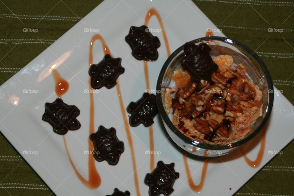 Turtle Frosted Flakes: Frosted Flakes cereal with caramel and chocolate syrups, pecans and turtle shaped chocolates 