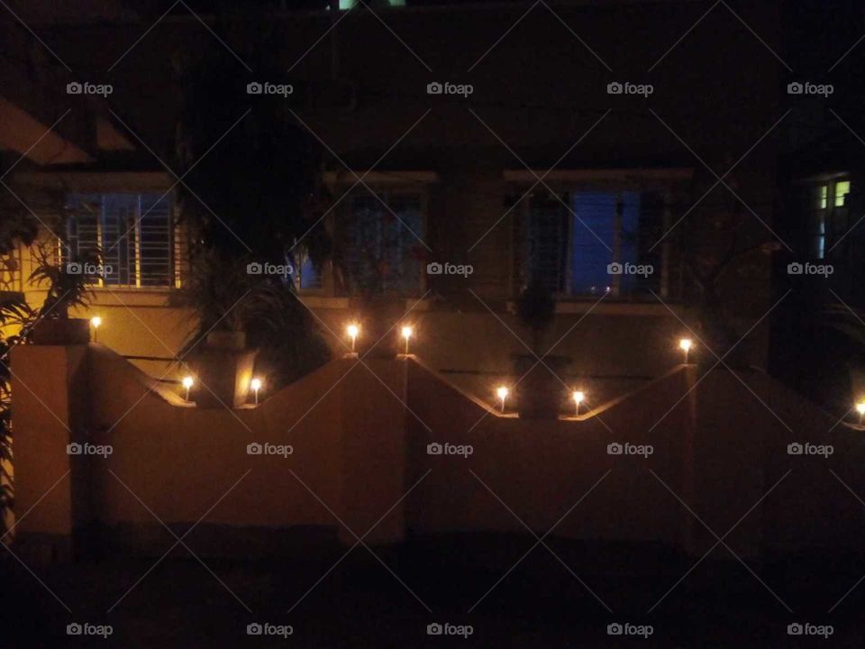 This is a roof top of a house in Diwali occasion in India