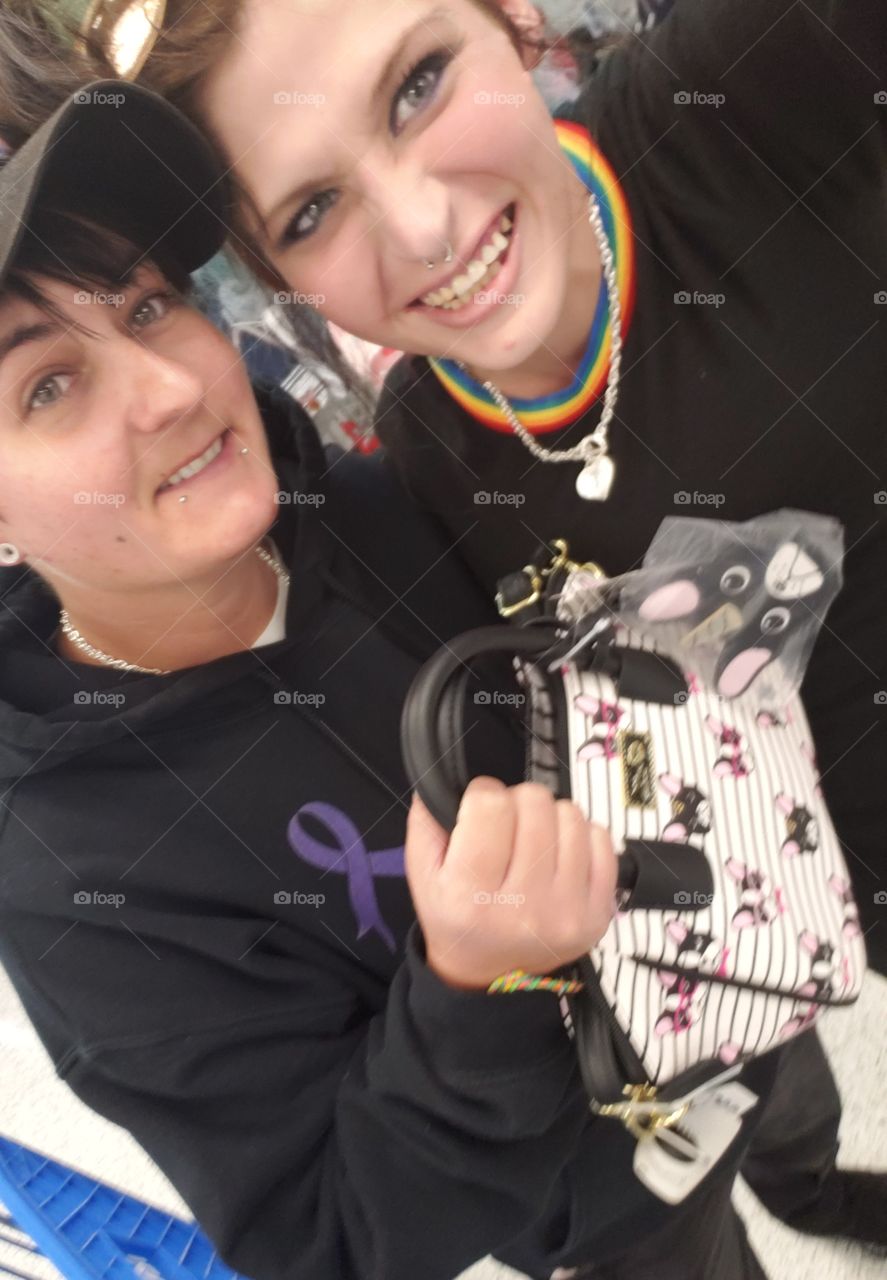 Michelle and I at the store. She knows I LOVE Betsey Johnson...and this cute mini purse has little Boston Terriors like our dog... MIA! I always buy stuff with dogs that look like my dog Mia
