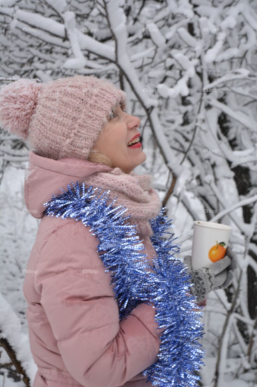 girl with cup in the snowy park Christmas time cozy winter ❄️