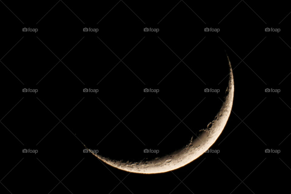 moon sliver wider than a smile