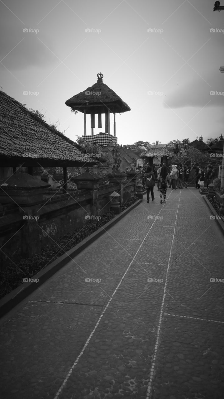 Tourist walking near temple