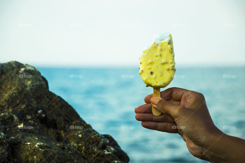 Person holding ice cream