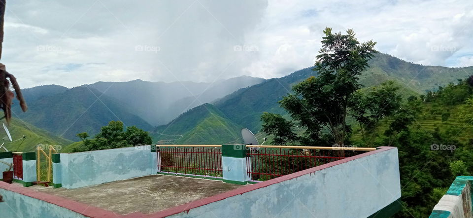 Rain descending down the hills