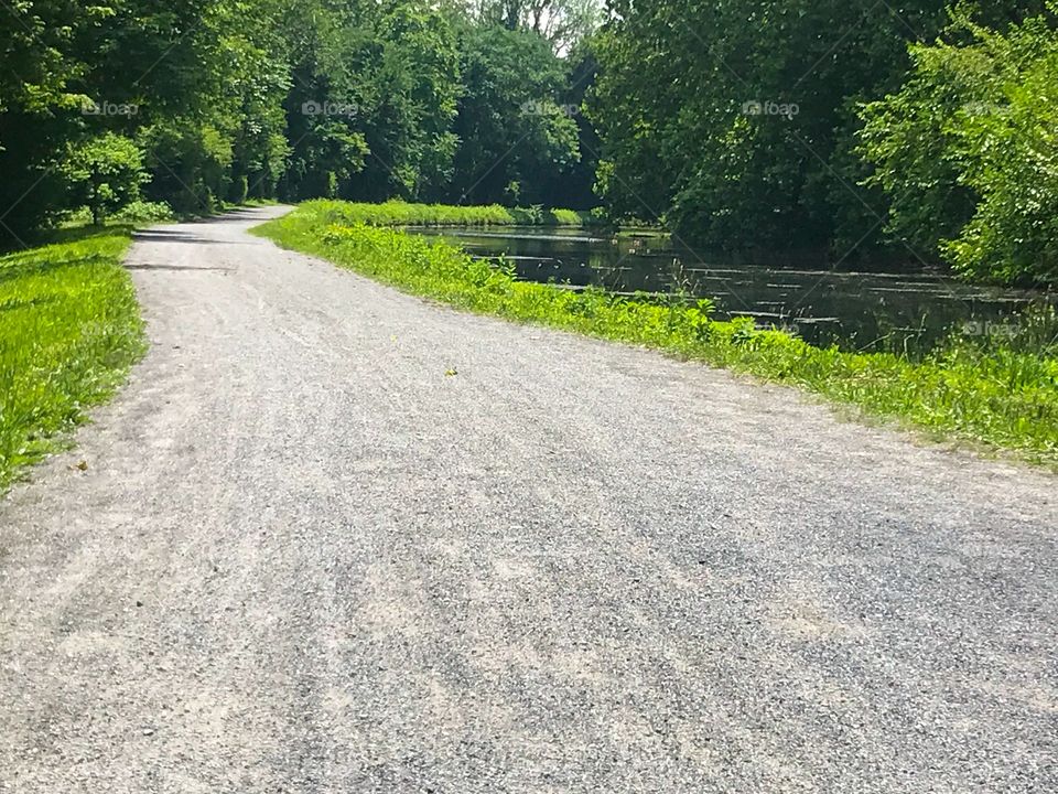 Hiking trail next to river.