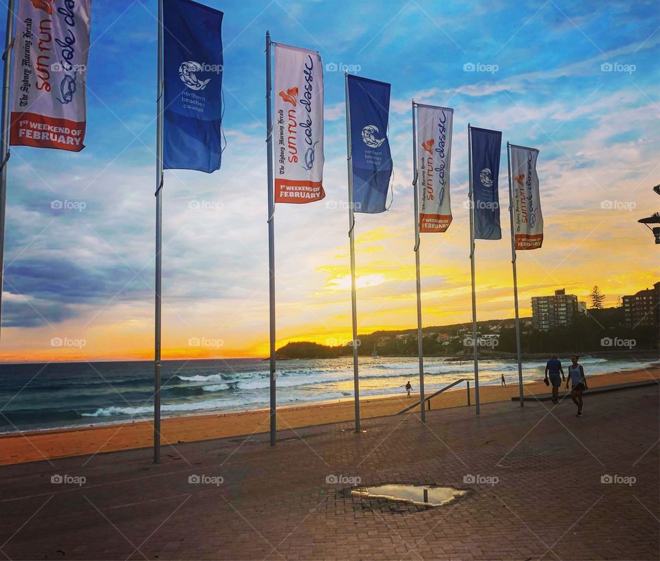 Flags at Manly Beach at sunrise Sydney 