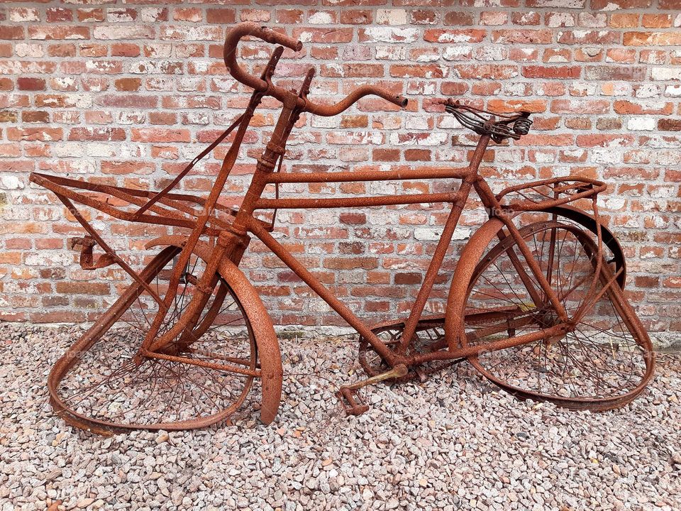 Rusted bicycle but it served for a long time