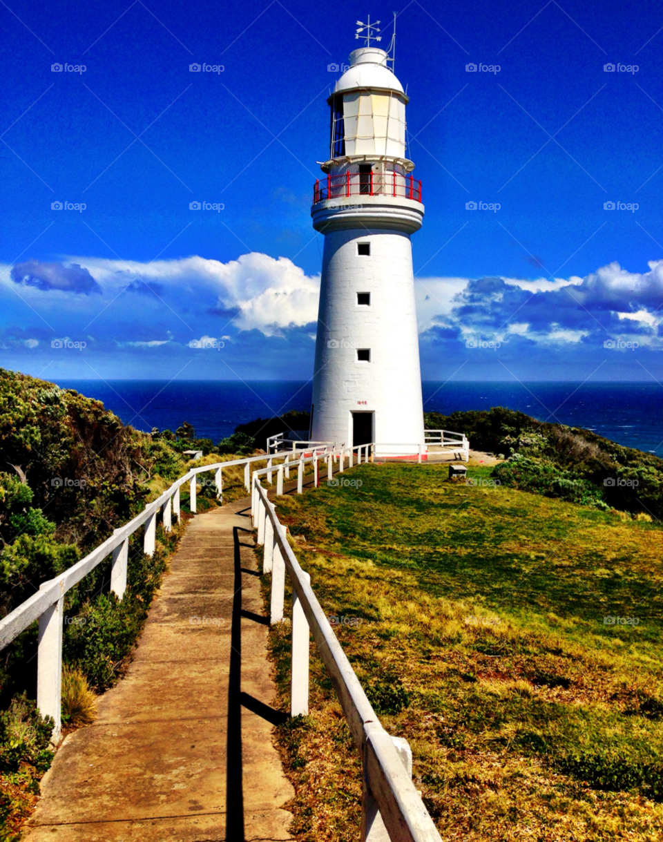 View of lighthouse by sea