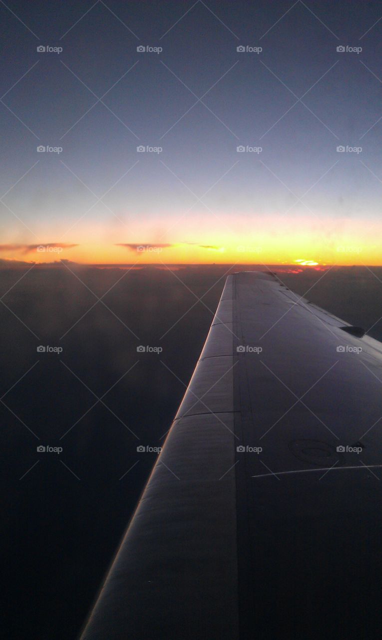 sunset from a jet. flying over Florida