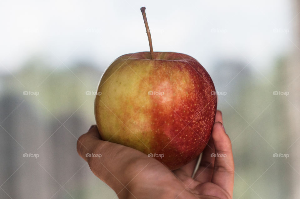 Apple in hand