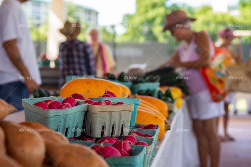 Farmers market with fresh fruit & vegetables on a nice sunny summer day