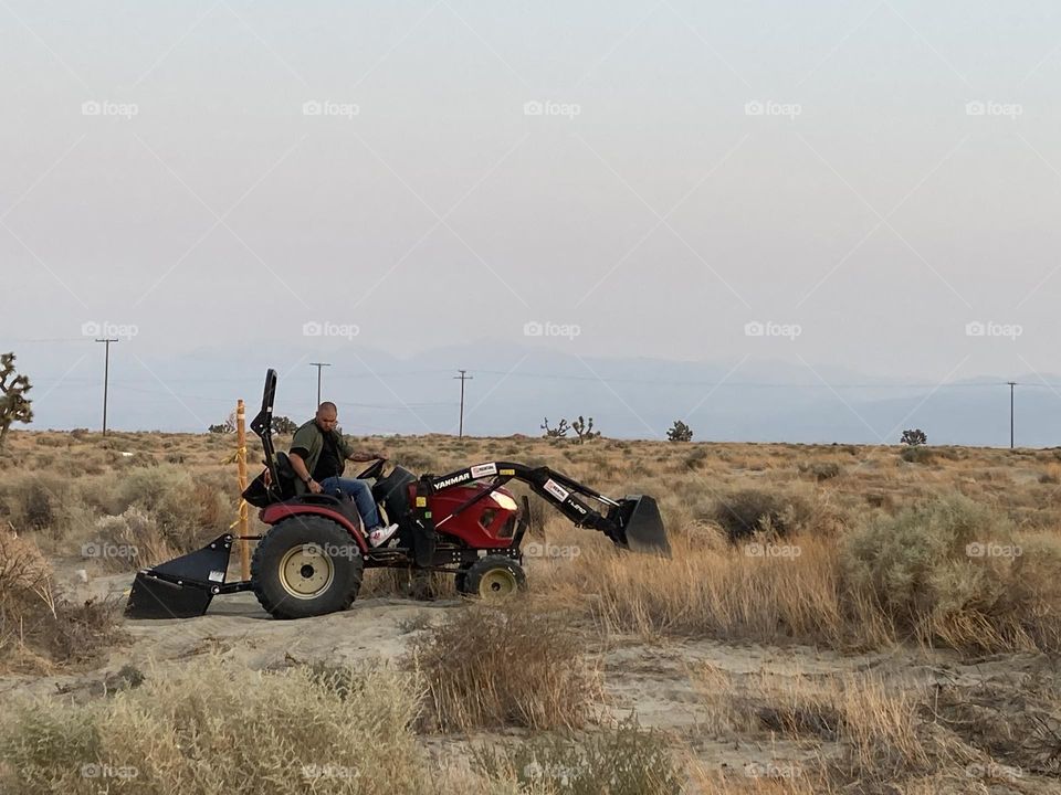 Our first attempt at flattening the vacant land we recently acquired. 