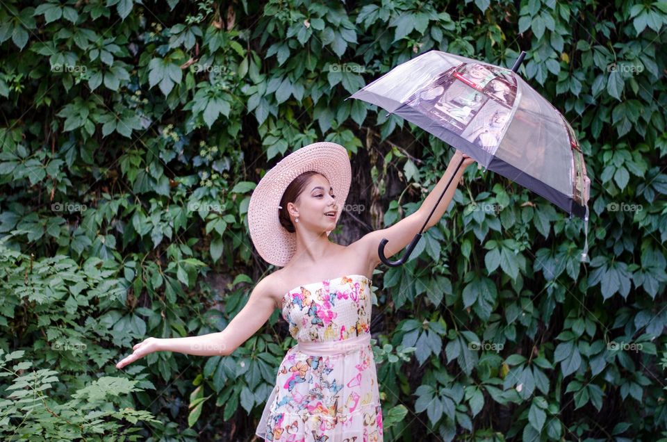 Pretty Young Girl Posing with Umbrella