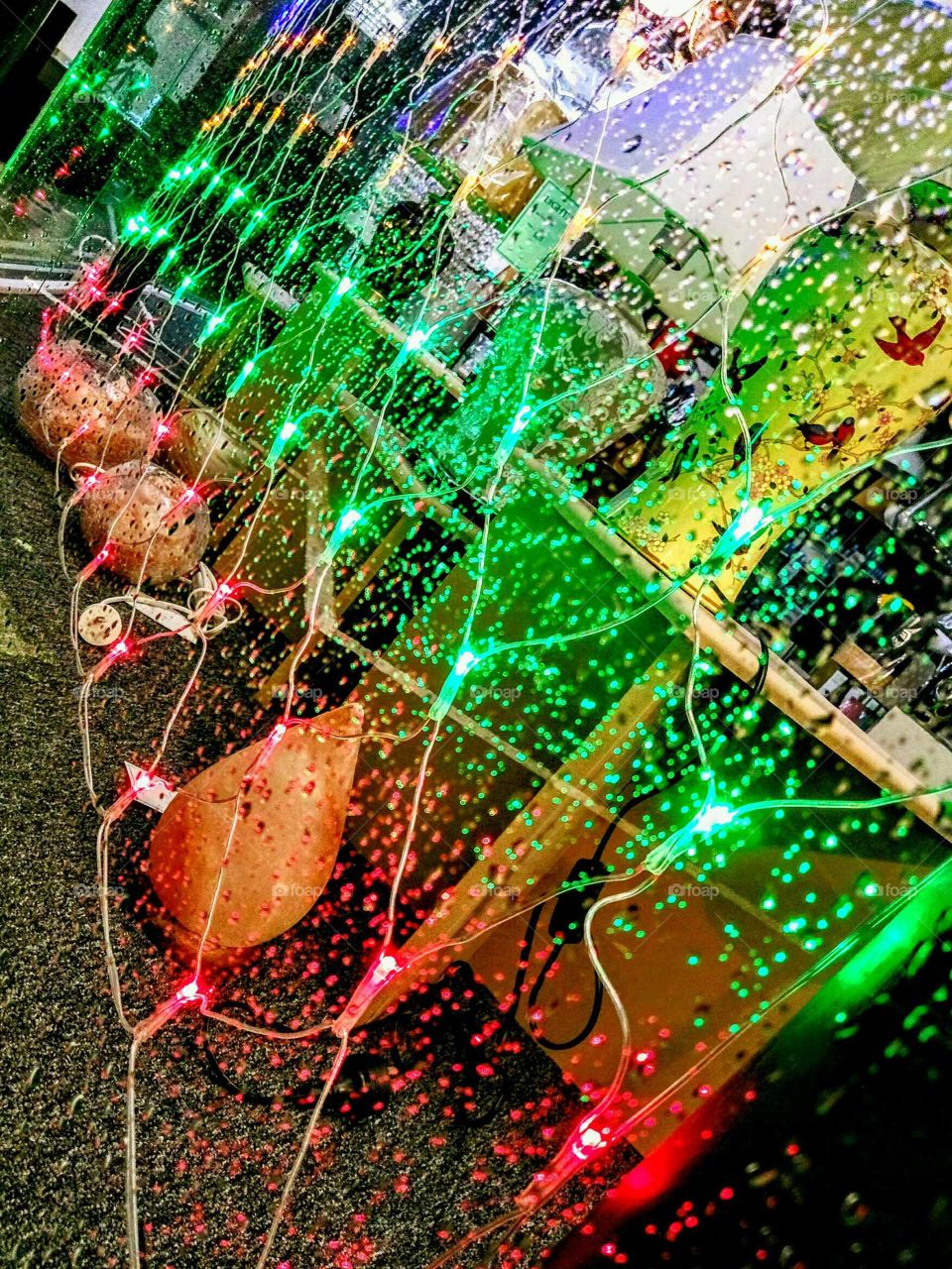 light in window on rainy night tilted angle shot