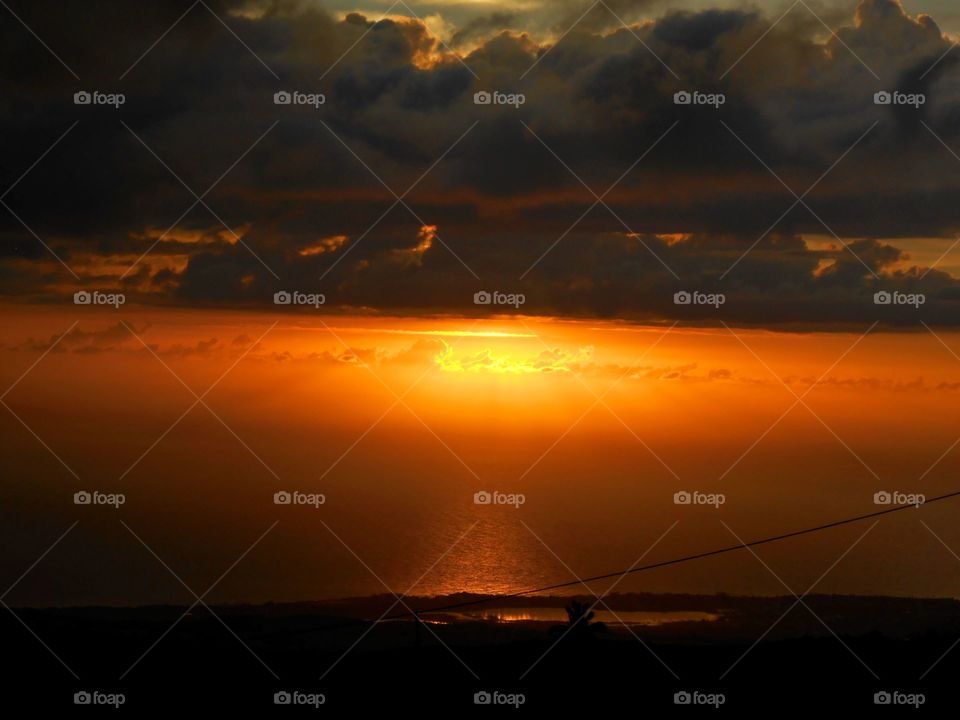 Heavy Clouds At Sunset
