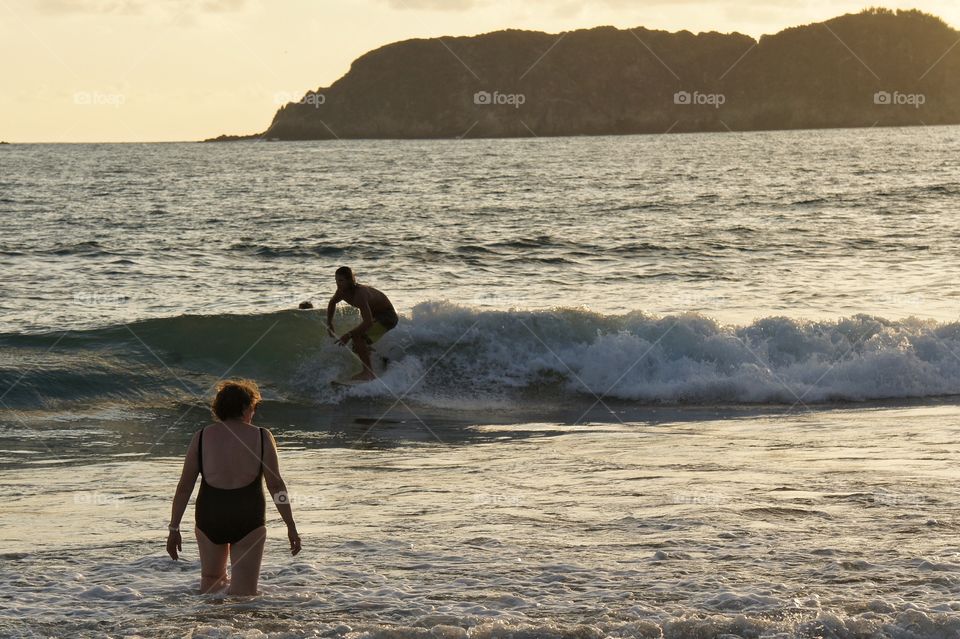 Watching surfers