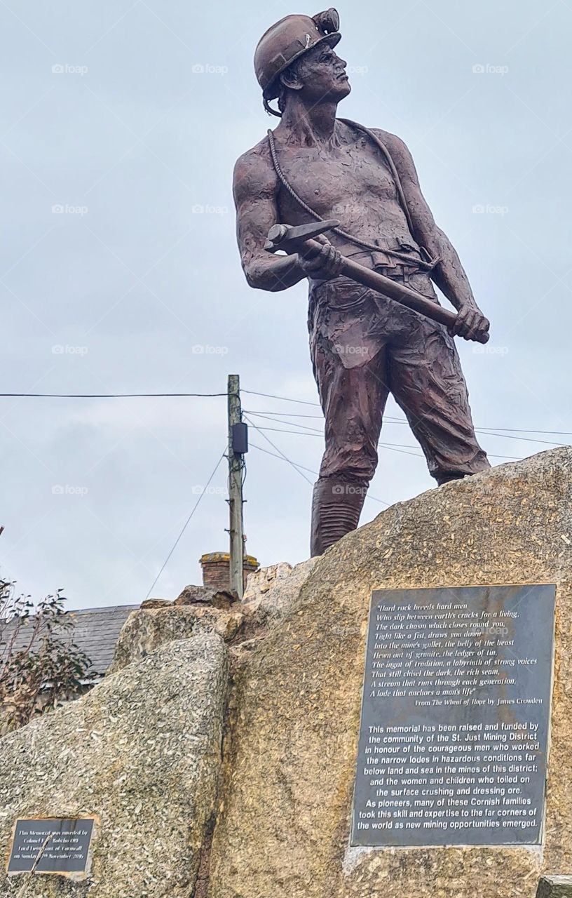 Tin mining statue