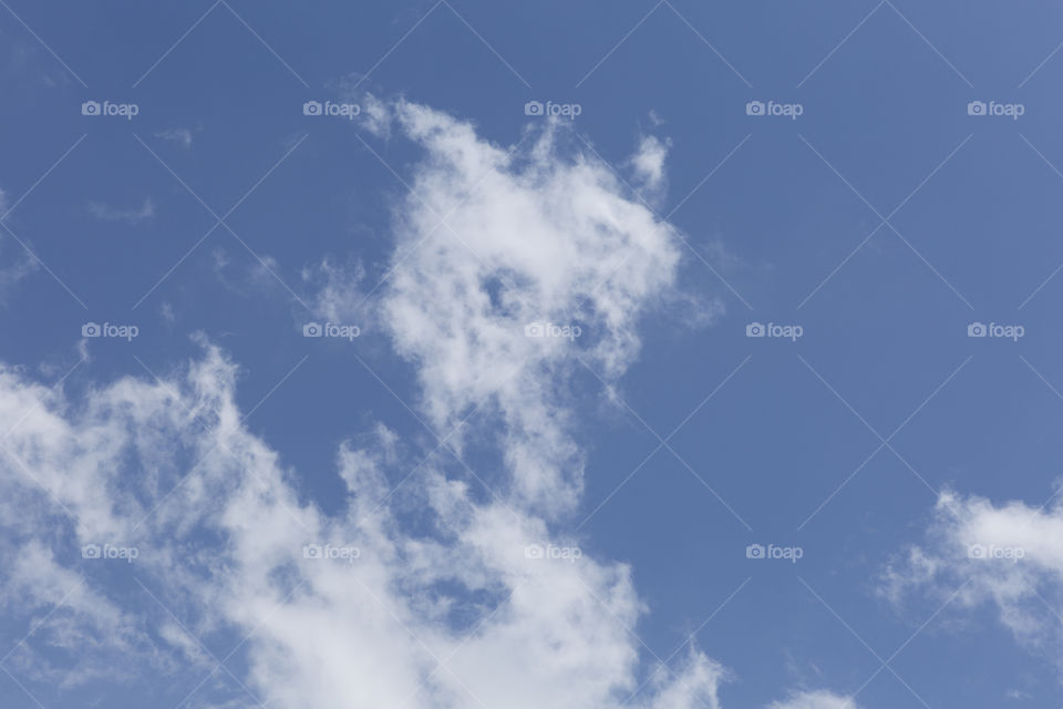 Blue sky with clouds.
