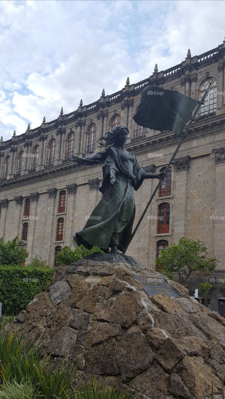 taken on a nice day in downtown Guadalajara. A statue of the woman who was one of the city's founders