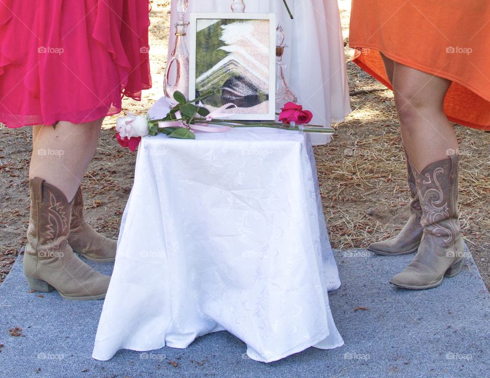 Cowgirl bridesmaids at an outdoor summer wedding in Central Oregon. 