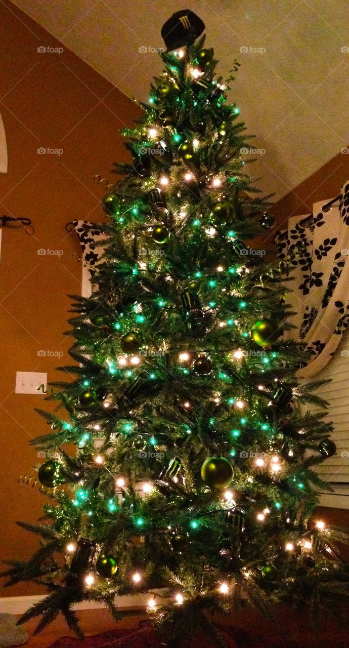 Christmas tree with lights and balls grinch green