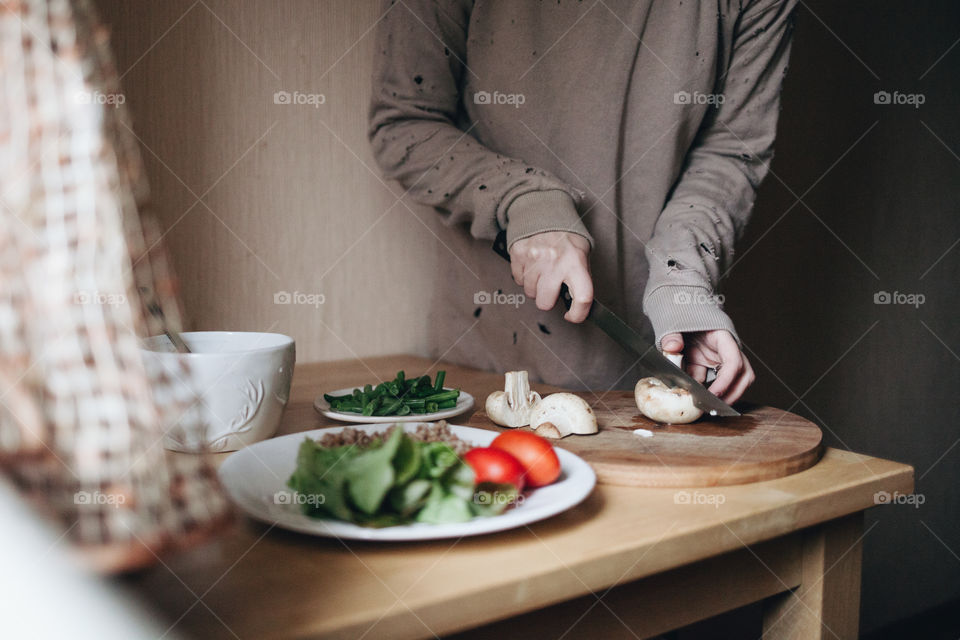 A women cooking food at home