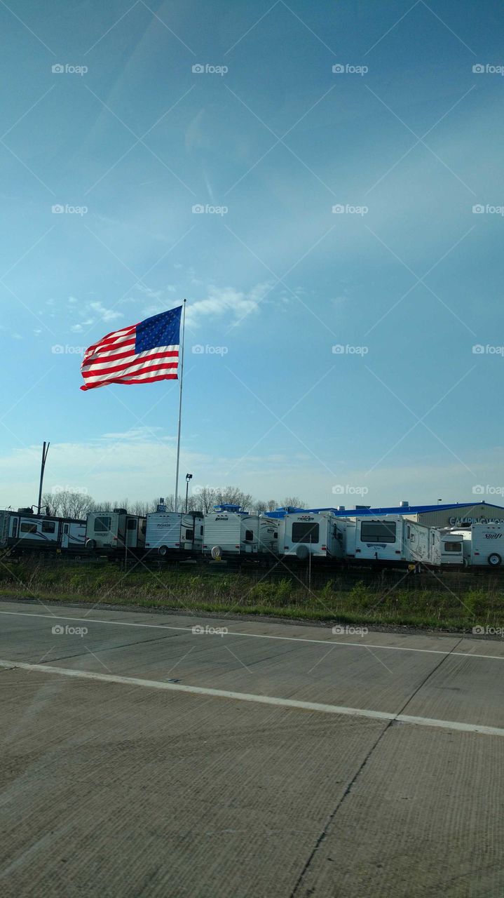 American flag flys over the American dream of freedom