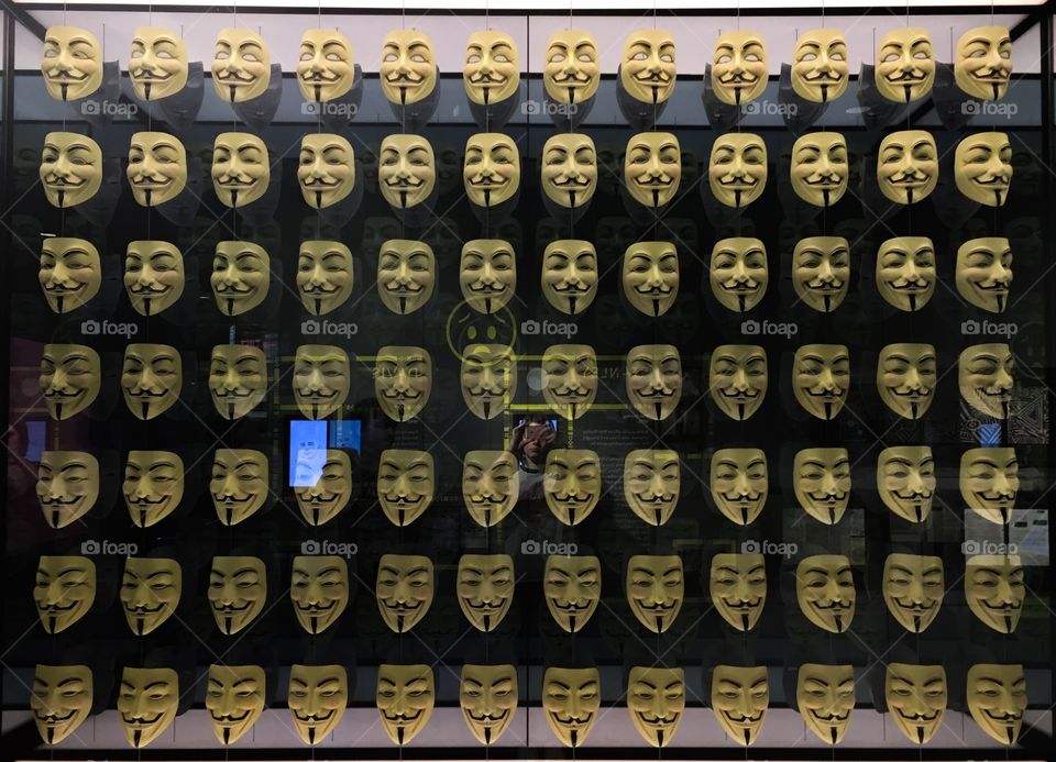 Anonymous masks at spy museum in New York City, New York.