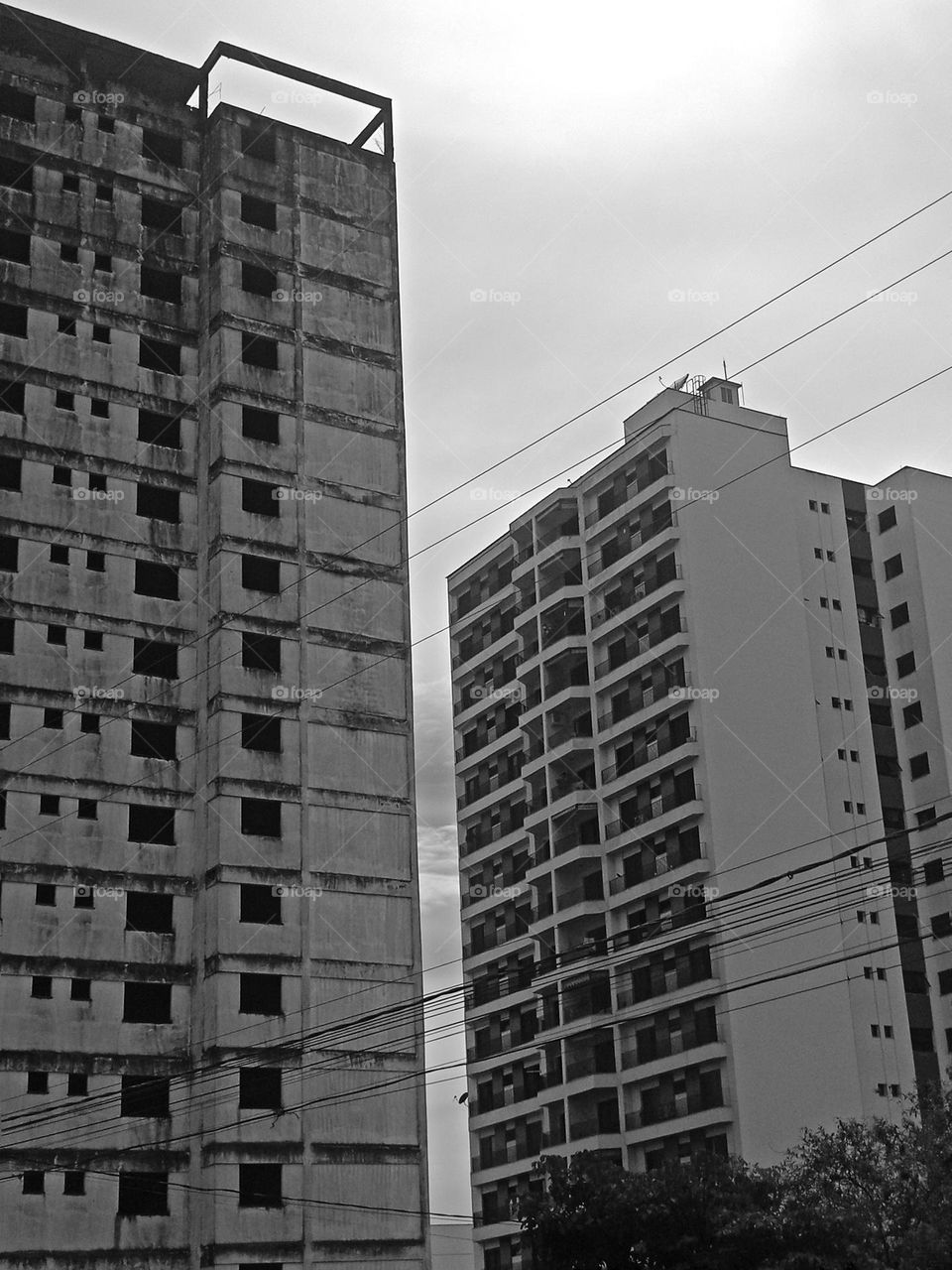 Old abandoned building and a residential newer building