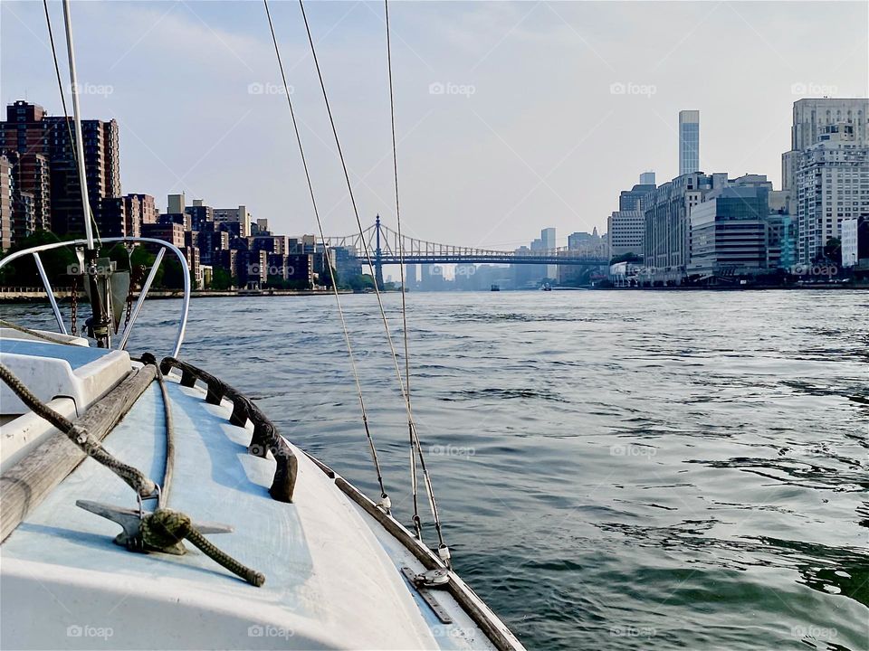The “59th St Ed Koch Queensboro Bridge” is gradually coming closer and closer into view as we are motoring along the “East River” towards “Newtown Creek” in LIC, Queens, the destination of our new boat’s maiden voyage. 2023. Hypnotic Productions