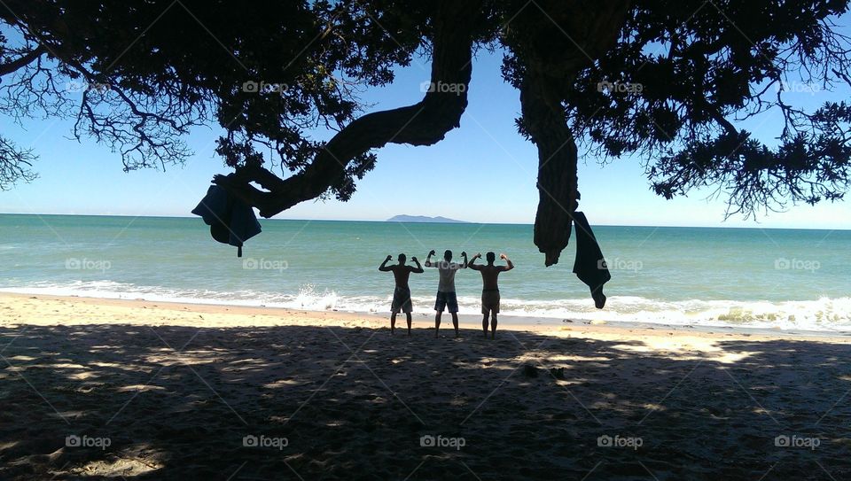 We are the only ones here. we were at the beach in new zealand where nobody else was, we had a waterfall and a tree which offered us a nice shadow