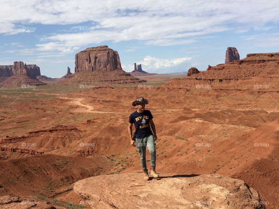 A Cow boy in the Monument valley