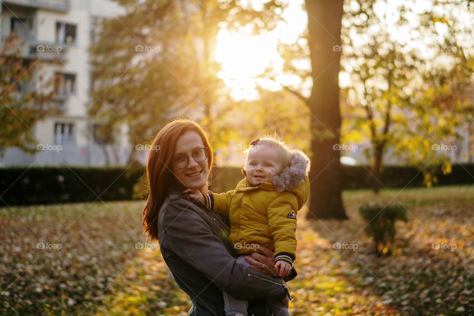 mom and daughter in a park
