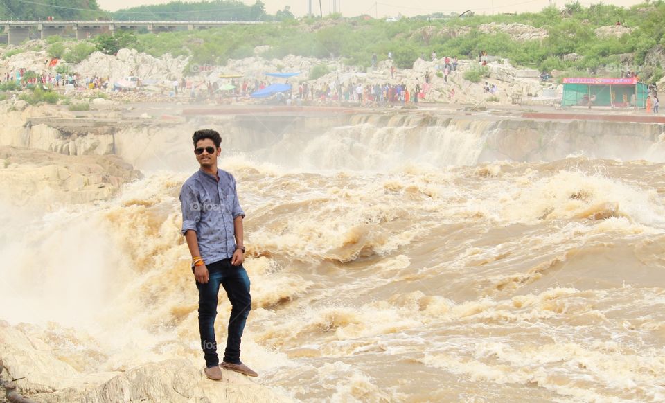 Real image..no editing fearless guy near waterfall 