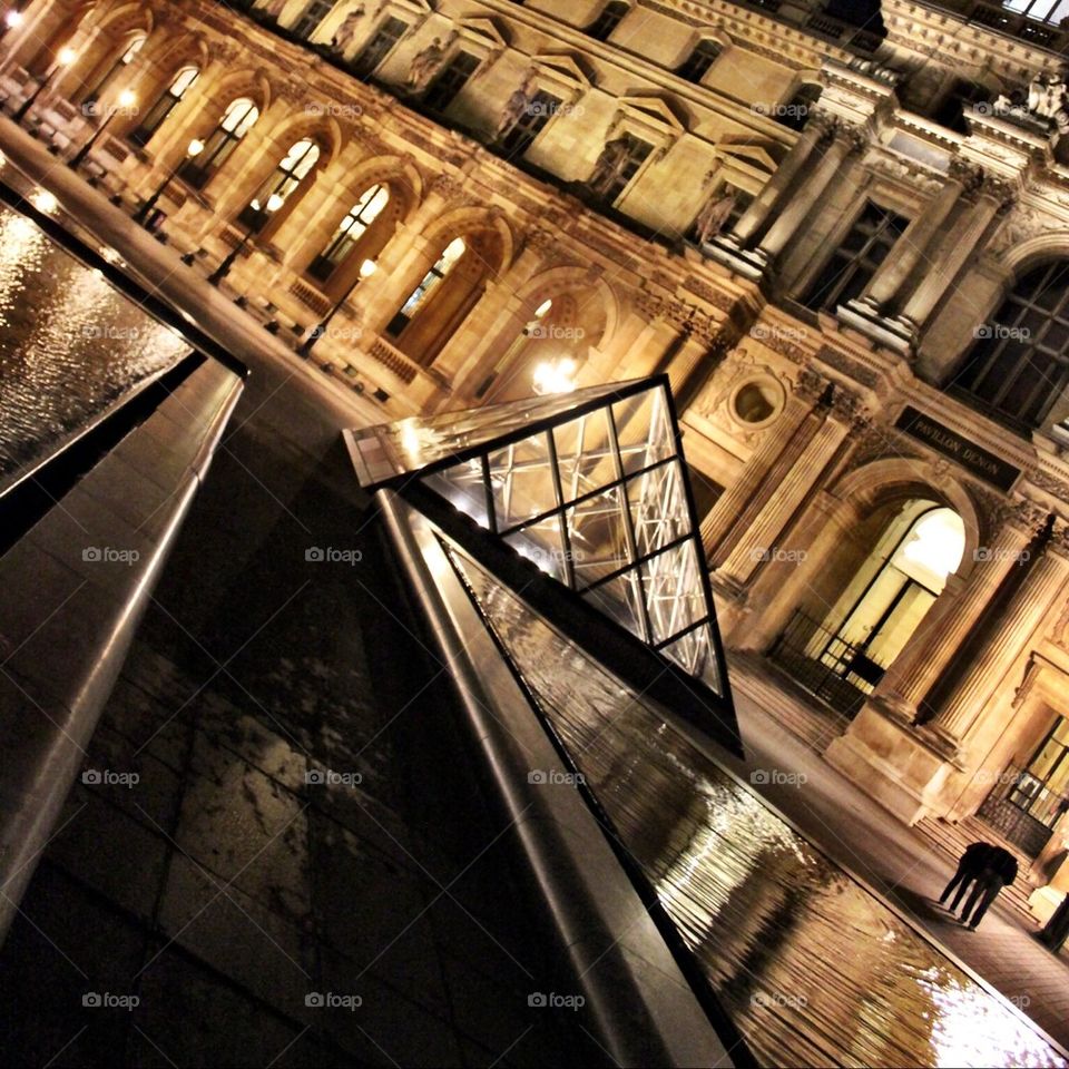 Louvre museum in Paris at night 