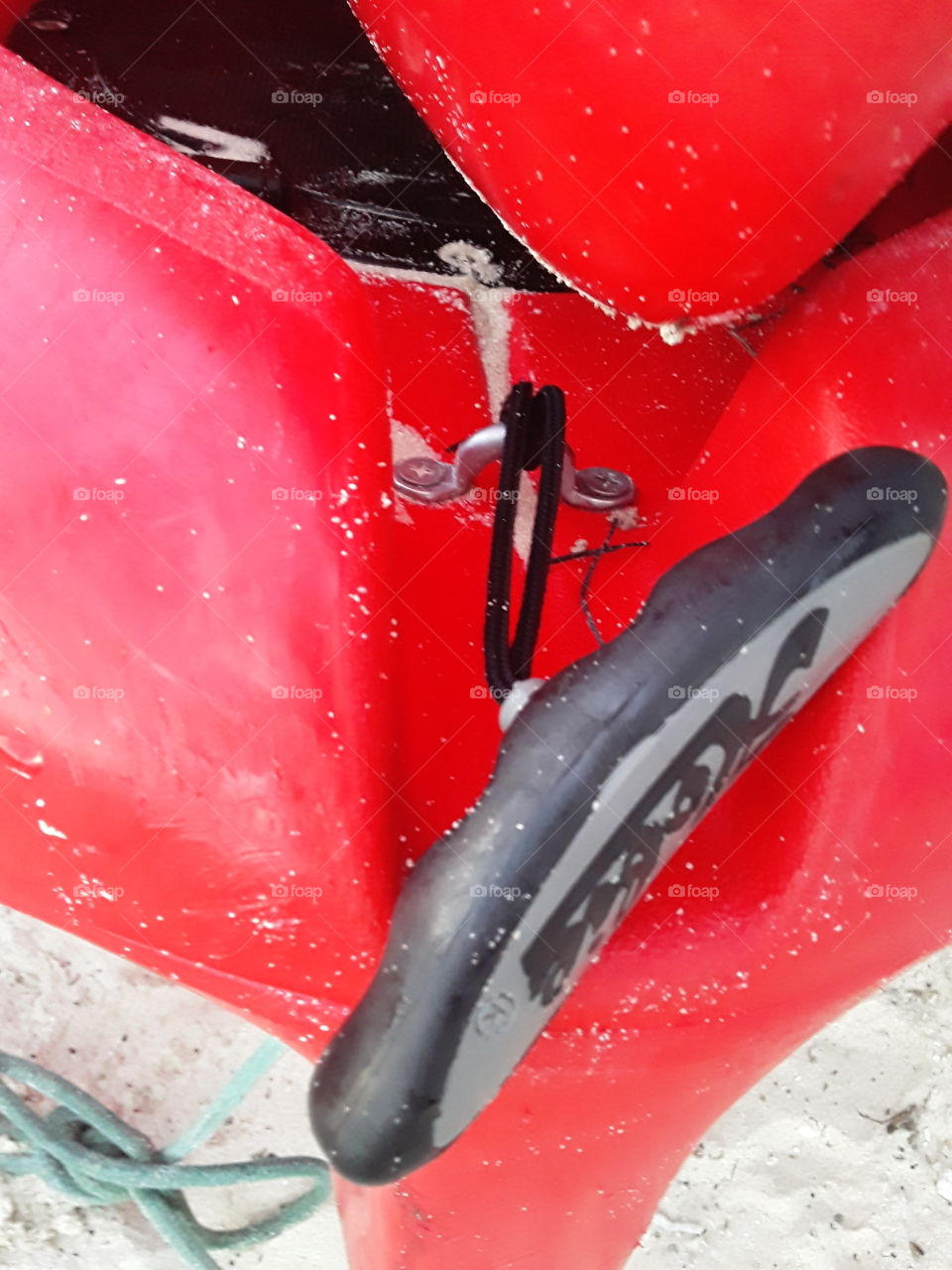 red kayak and its rigging