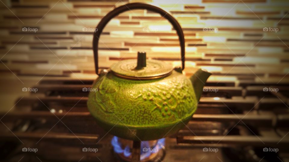 green cast iron tea pot