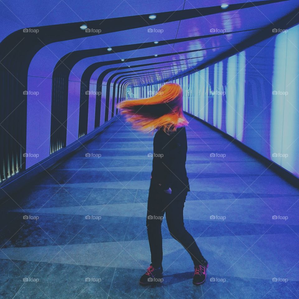 Stormy redhead in the tunnel