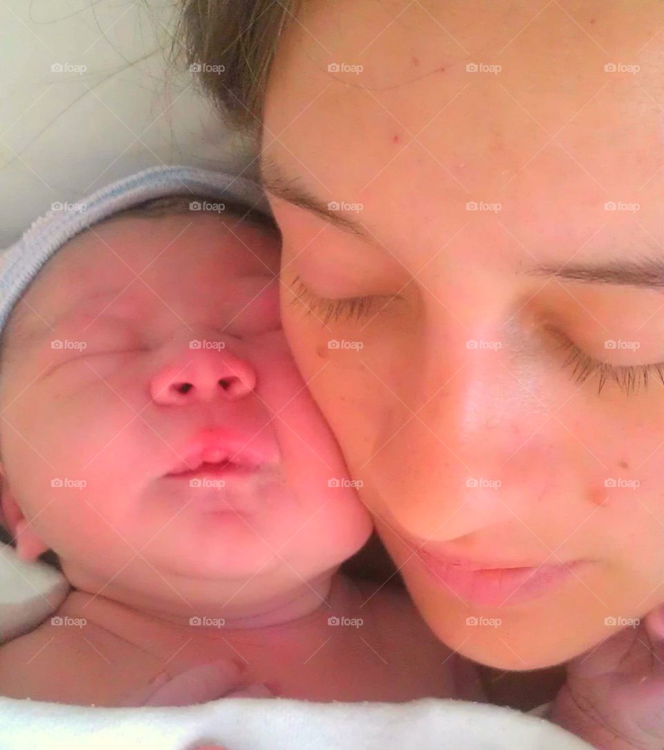 Bonding . New Mom and Newborn First Daughter