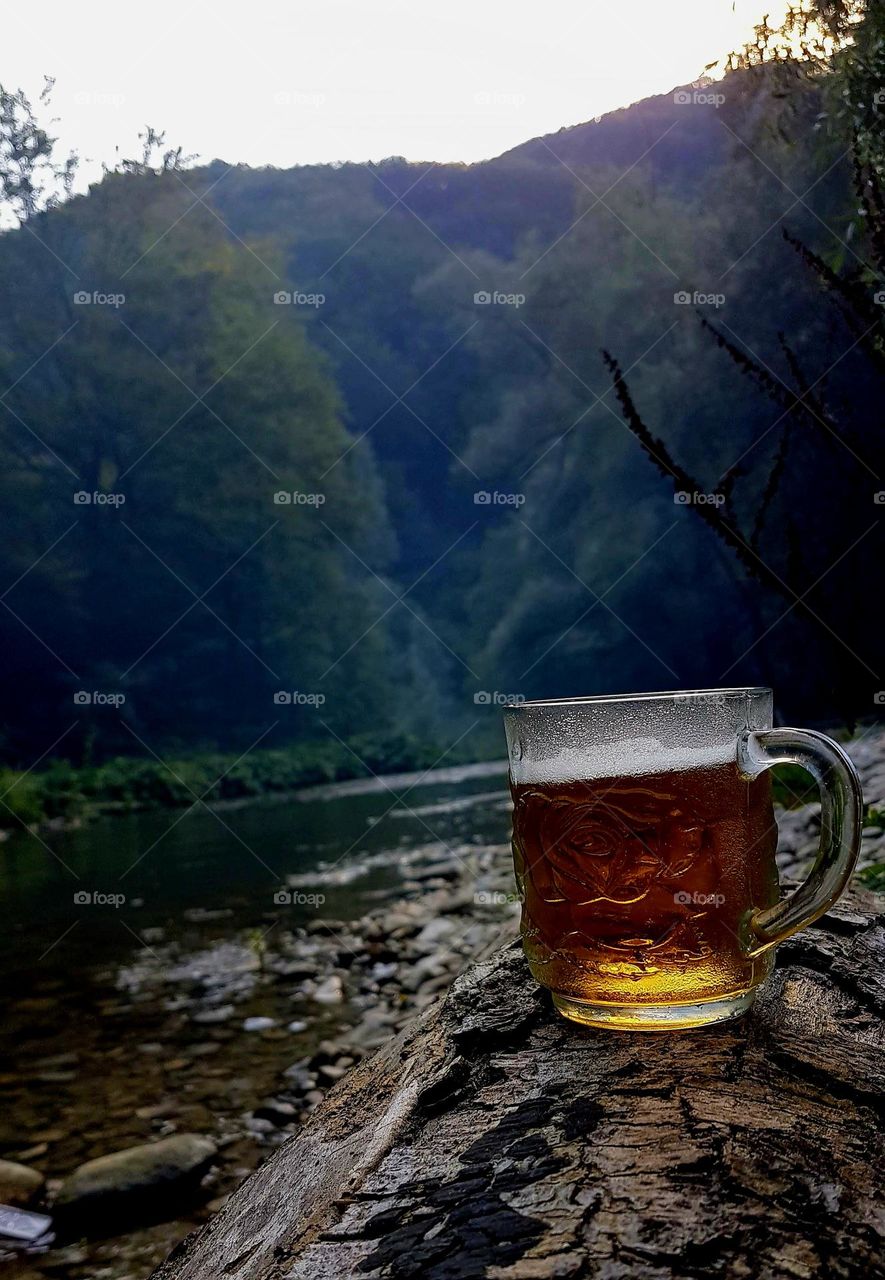 beer by the mountain river