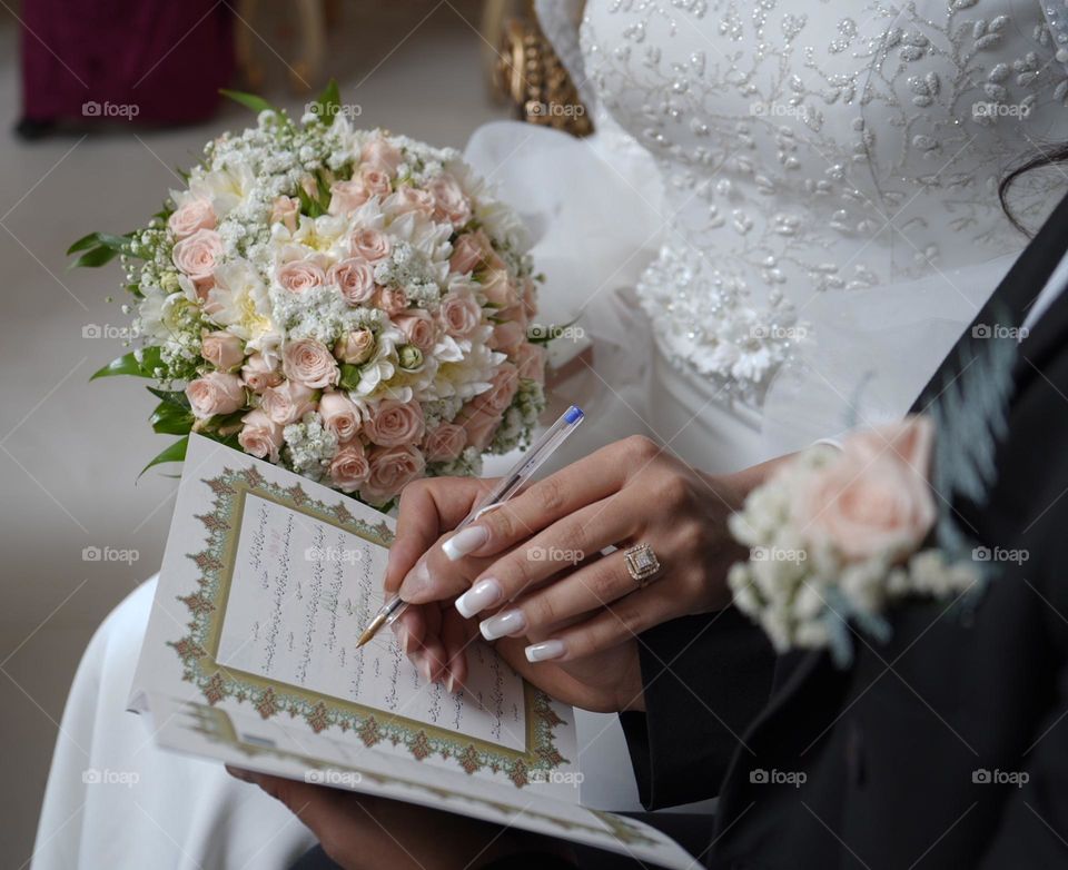 In my land, at the wedding stage, the bride and groom are officially declared husband and wife, sign a meaningful document as their marriage document and become united in order to be with each other in sorrows and joys throughout their life together.