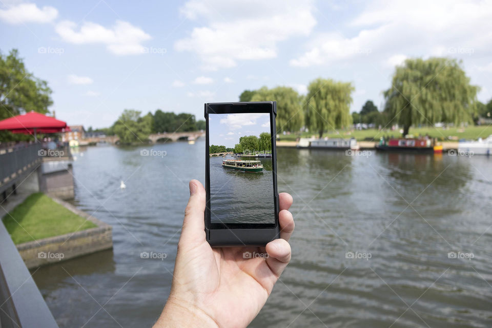 Phone. Camera phoneTourist taking a picture with a smartphone cell phone mobile phone camera 