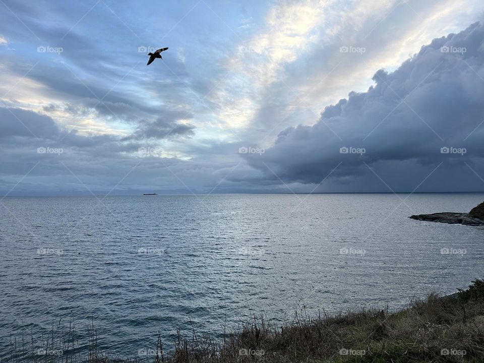 Cloudy sky above the ocean 