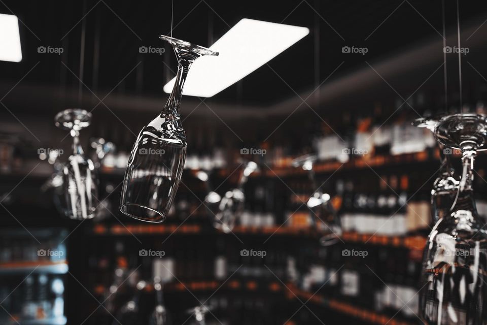 Cafe decorated with glass hanging on rope .